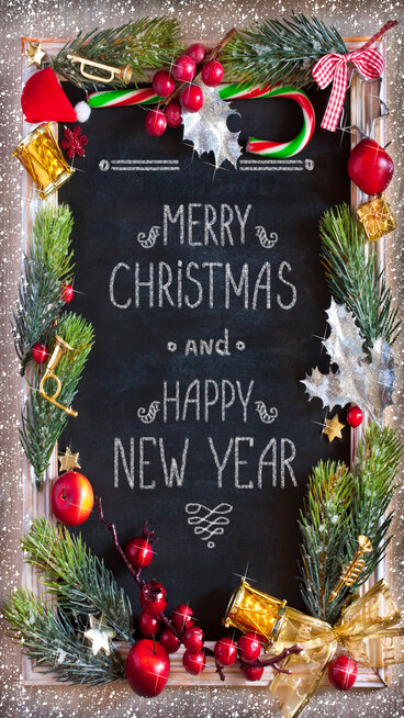 Chalk blackboard Christmas congratulation with Christmas decorations. Retro style. Christmas card.